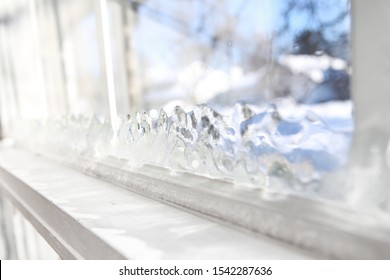 Ice Forming On The Inside Glass Of A Drafty Window In Winter, Shallow Focus On Ice