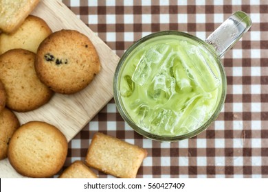 Ice Green Tea And Cookies On Table.