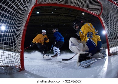 Ice Hockey Goalkeeper  Player On Goal In Action
