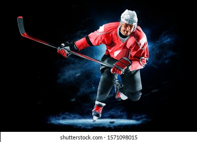 ice hockey player isolated on black background
