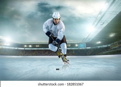 Ice hockey player on the ice. Open stadium - Winter Classic game.