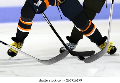 Ice Hockey Players On Rink 