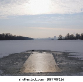 Ice Hole In The Winter Lake