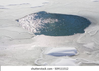 Ice Hole For Winter Swimming . Hole In The Frozen Lake For Winter Fishing