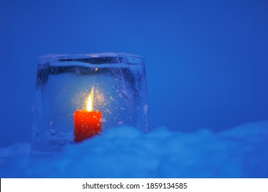 Ice Lantern In Snow At Dusk