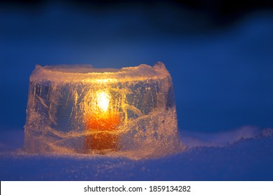 Ice Lantern In Winter Snow At Dusk