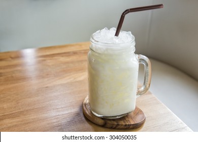 Ice Milk With Plate On Wood Table