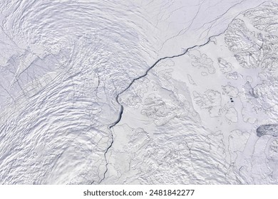 Ice in Motion. While pack ice gets jostled by winds and currents in the open ocean, fast ice usually clings to land masses in shallow areas. Elements of this image furnished by NASA.