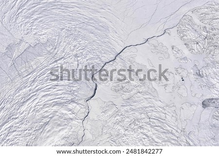 Ice in Motion. While pack ice gets jostled by winds and currents in the open ocean, fast ice usually clings to land masses in shallow areas. Elements of this image furnished by NASA.