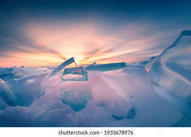 Ice On Winter Baikal Lake At Sunrise. Beautiful Winter Landscape. Baikal, Siberia, Russia. Selective Focus.