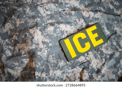 ICE patch with a army background.