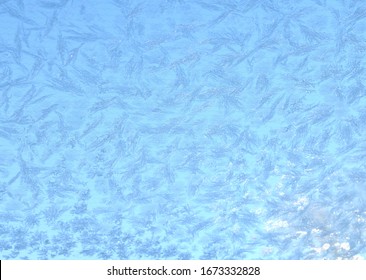 Eismuster auf Winterglas