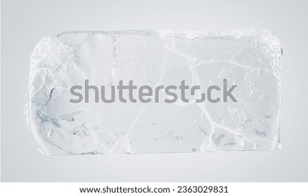 Ice piece with cracks. A rectangular block of ice, isolated on a white background.