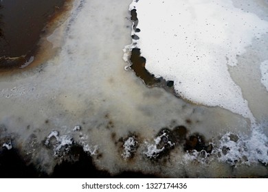 Ice Piece With Snow In The River, Spring Time. View From The Top