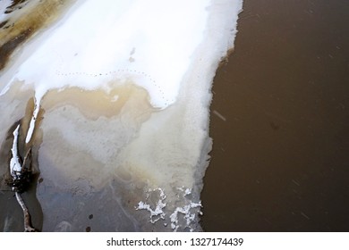 Ice Piece With Snow In The River, Spring Time. View From The Top