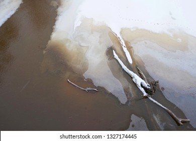 Ice Piece With Snow In The River, Spring Time. View From The Top