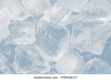 Ice Pieces Texture Background. Crushed Ice Blue Toned Pattern.