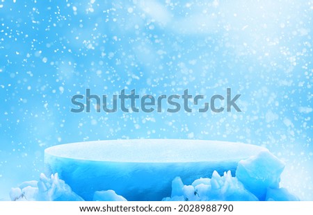 Ice podium with snowy background for mockup display or presentation of products. Advertising theme concept.