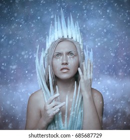 Ice Queen. Snowy Portrait Of A Girl With Ice Crown