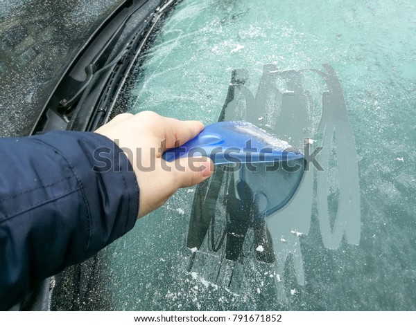 car windscreen scraper