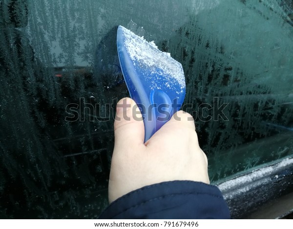 car windscreen scraper