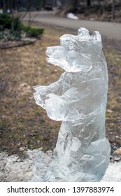 An Ice Sculpture Of A Frozen Bear Stands In An Indiana Woods After A Ice Sculpting Demonstration