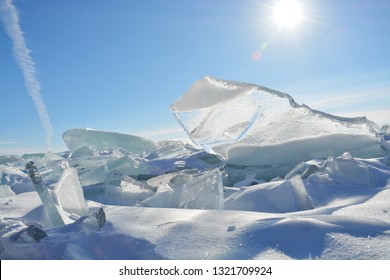 Ice Shards Sun Shining Through a Clear Piece of Ice - Kitchi Gammi Park - Lake Superior - Duluth, Minnesota 
