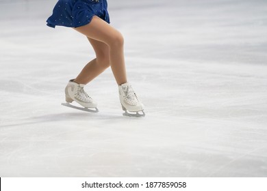 Ice Skating shoes white color on freeze ice  skate field                                      - Shutterstock ID 1877859058