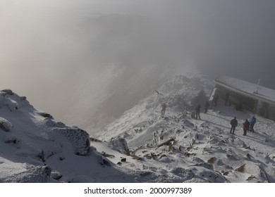 The Ice And Snow Clad Summit Of Mount Snowdon, Snowdonia, Wales On A Sunny Winter Day