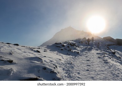 The Ice And Snow Clad Summit Of Mount Snowdon, Snowdonia, Wales On A Sunny Winter Day