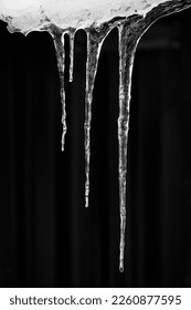Ice stalactites falling after some days of heavy cold.