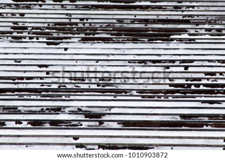 ice steps ladder in the snow
