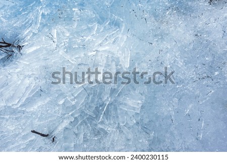 Ice sticks on Putorana Plateau, Taimyr. Russia. Winter texture. Melting snow natural background