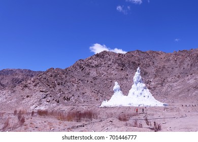 Ice Stupa Placed On Mountain Background , Leh India