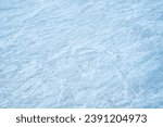 Ice surface texture. Textured cold frosty surface of icings. Clear and freshwater ices. Natural scratched icesat the ice rink as textured. Texture of icing surface