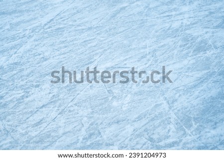 Ice surface texture. Textured cold frosty surface of icings. Clear and freshwater ices. Natural scratched icesat the ice rink as textured. Texture of icing surface