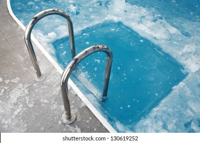 Ice Swimming Theme. Steps In The Frozen Blue Pool Ice-hole