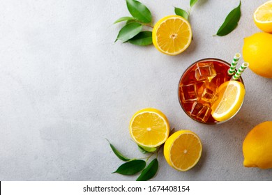 Ice Tea With Fresh Lemons. Grey Background. Copy Space. Top View.