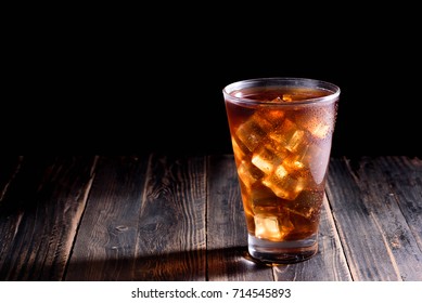 Ice tea  on wooden table / dark background - Shutterstock ID 714545893