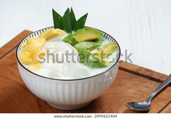 Ice teler or es teler-indonesian fruit\
cocktail,Avocado, young coconut, jackfruit, served with coconut\
milk, sweetened condensed\
milk,