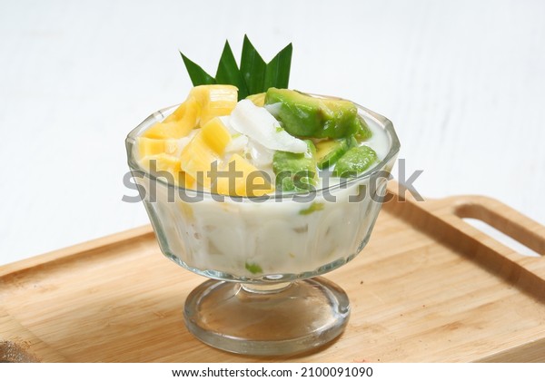 Ice teler or es teler-indonesian fruit\
cocktail,Avocado, young coconut, jackfruit, served with coconut\
milk, sweetened condensed\
milk,