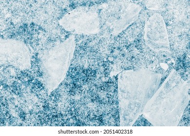 Ice Texture Background. Crushed Ice Blue-toned Pattern.