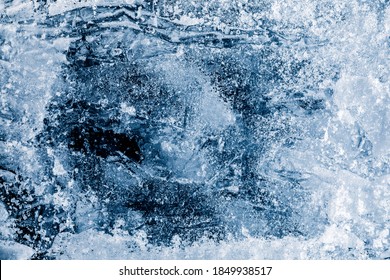 Ice Texture Background. Textured Cold Frosty Surface Of Ice Block On Dark Background.