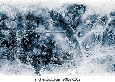 Ice Texture Background. The Textured Cold Frosty Surface Of Ice Block On Black Background.