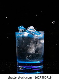 Ice Wather Splash In Blue Glass