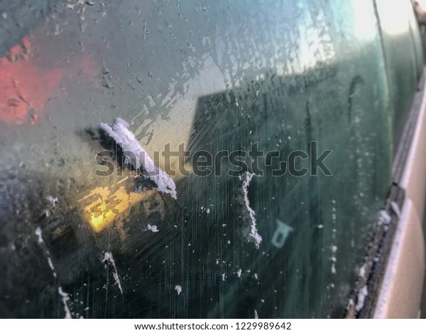 Ice in the window of a\
car in winter