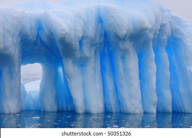 Iceberg and azure water in Antarctica