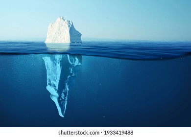 Iceberg in clear blue water and hidden danger under water. Iceberg - Hidden Danger And Global Warming Concept. Floating ice in ocean. Copyspace for text and design - Shutterstock ID 1933419488