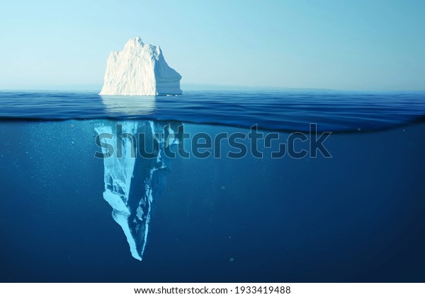 Iceberg in clear blue water and\
hidden danger under water. Iceberg - Hidden Danger And Global\
Warming Concept. Floating ice in ocean. Copyspace for text and\
design