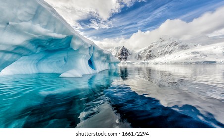 Iceberg Floats In Andord Bay On Graham Land, Antarctica